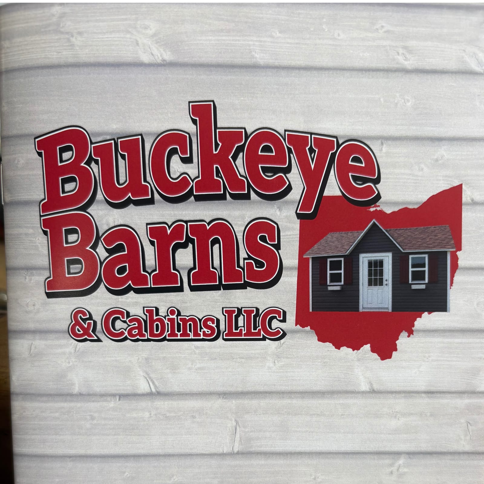 Buckeye Barns  and cabins LLC logo