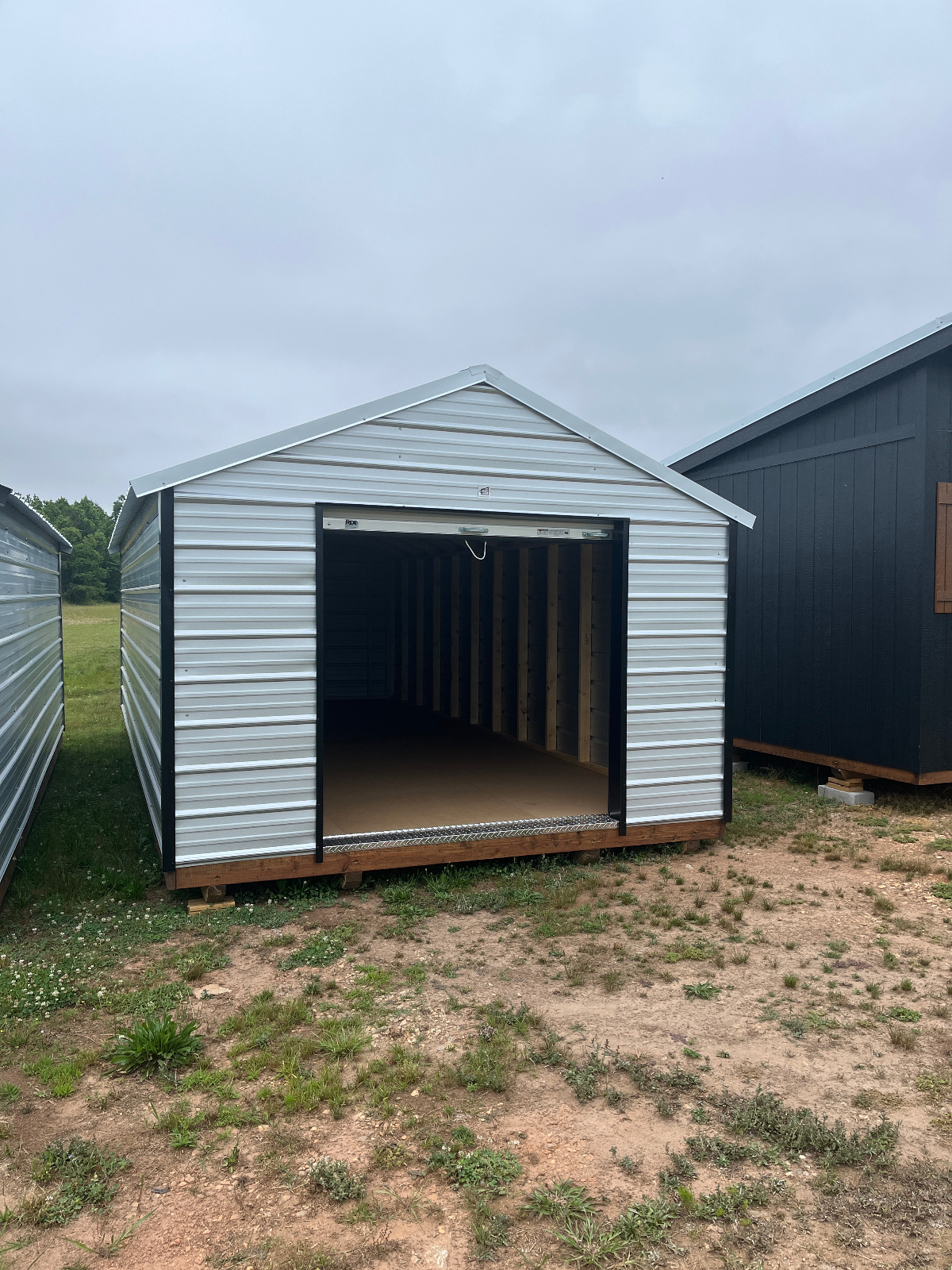 12' x 24' Parton Sheds - Greenville!  Summer Sale!  Save up to 10% on this 12x24 Metal Utility Building with a garage door and electric! for sale in Greenville, SC