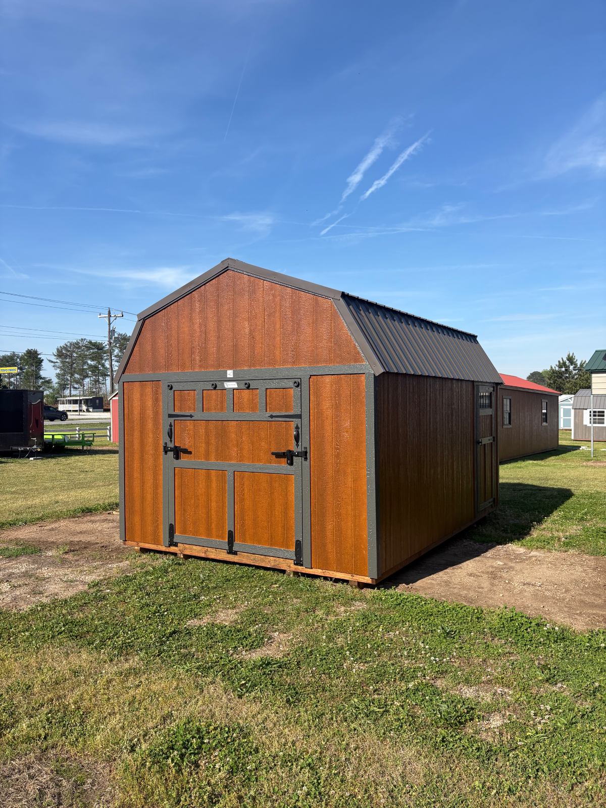 12' x 16' Parton Sheds - Greenville!  Spring Sale!  Save up to 10% on this 12x16 Lofted Barn with a Rampage Door! for sale in Greenville, SC